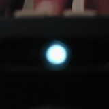 Photo of a circular blue light