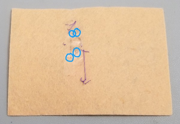 back of base patch showing extra sewn connections 
