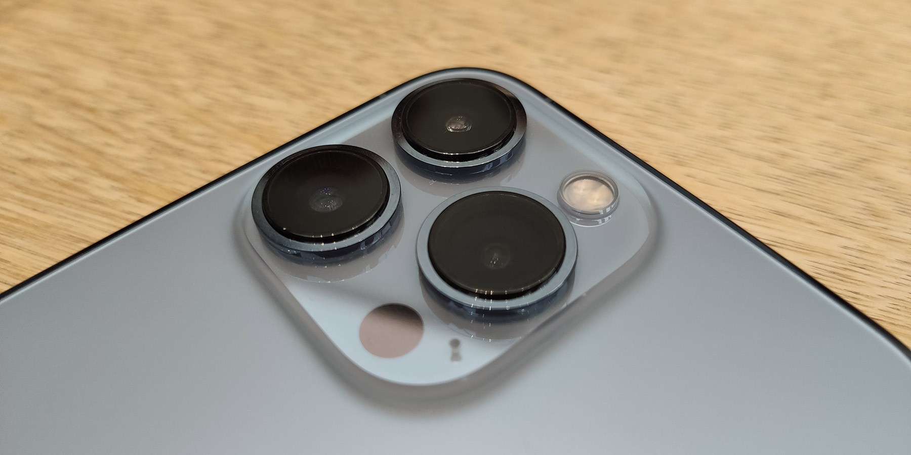 the three camera lenses on an iphone 13