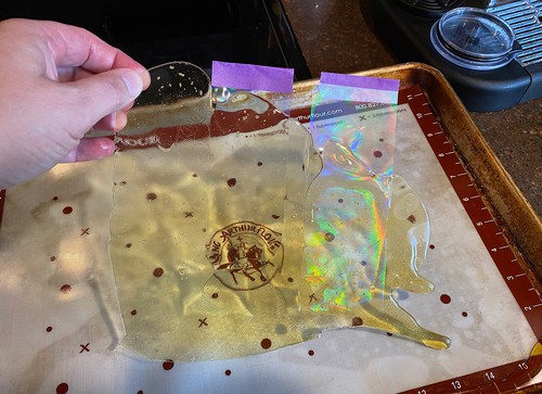 peeling the candy off the cookie sheet 