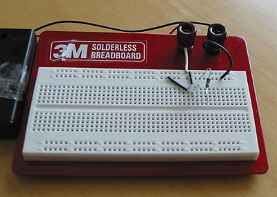 Photo of a light-to-voltage converter wired into a breadboard