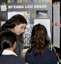 Emma Sesar with science fair project display board