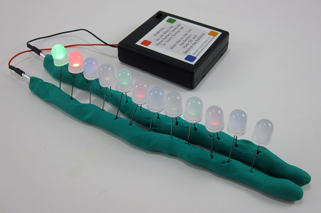 Ten LEDs are connected in parallel using long ropes of Play-Doh