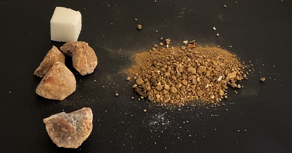 Sugar cubes and piles of granules - Weathering video lesson to explore the process of weathering and how it relates to sand