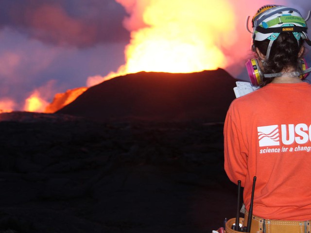 person observing volcano in Hawaii