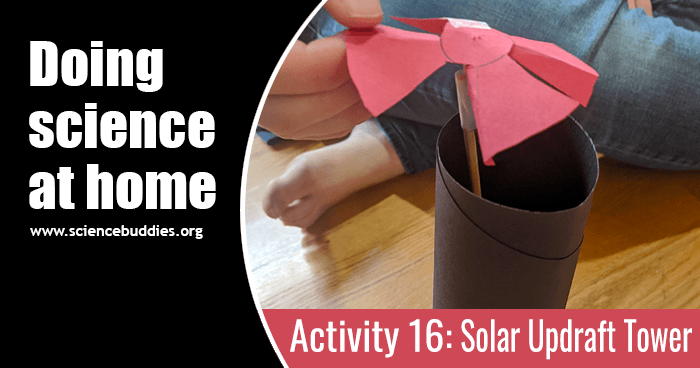 Solar updraft tower made from construction paper with a paper propeller on top for science activity