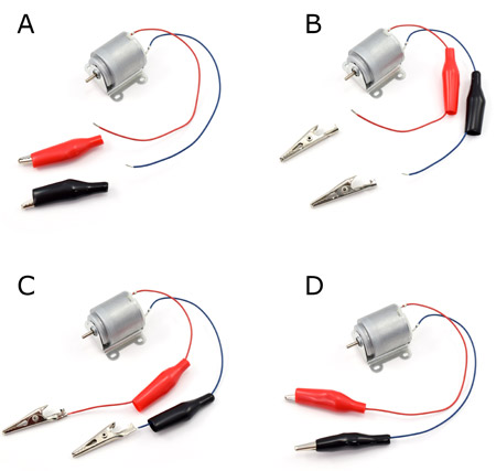 Connecting alligator clips to motor wires.