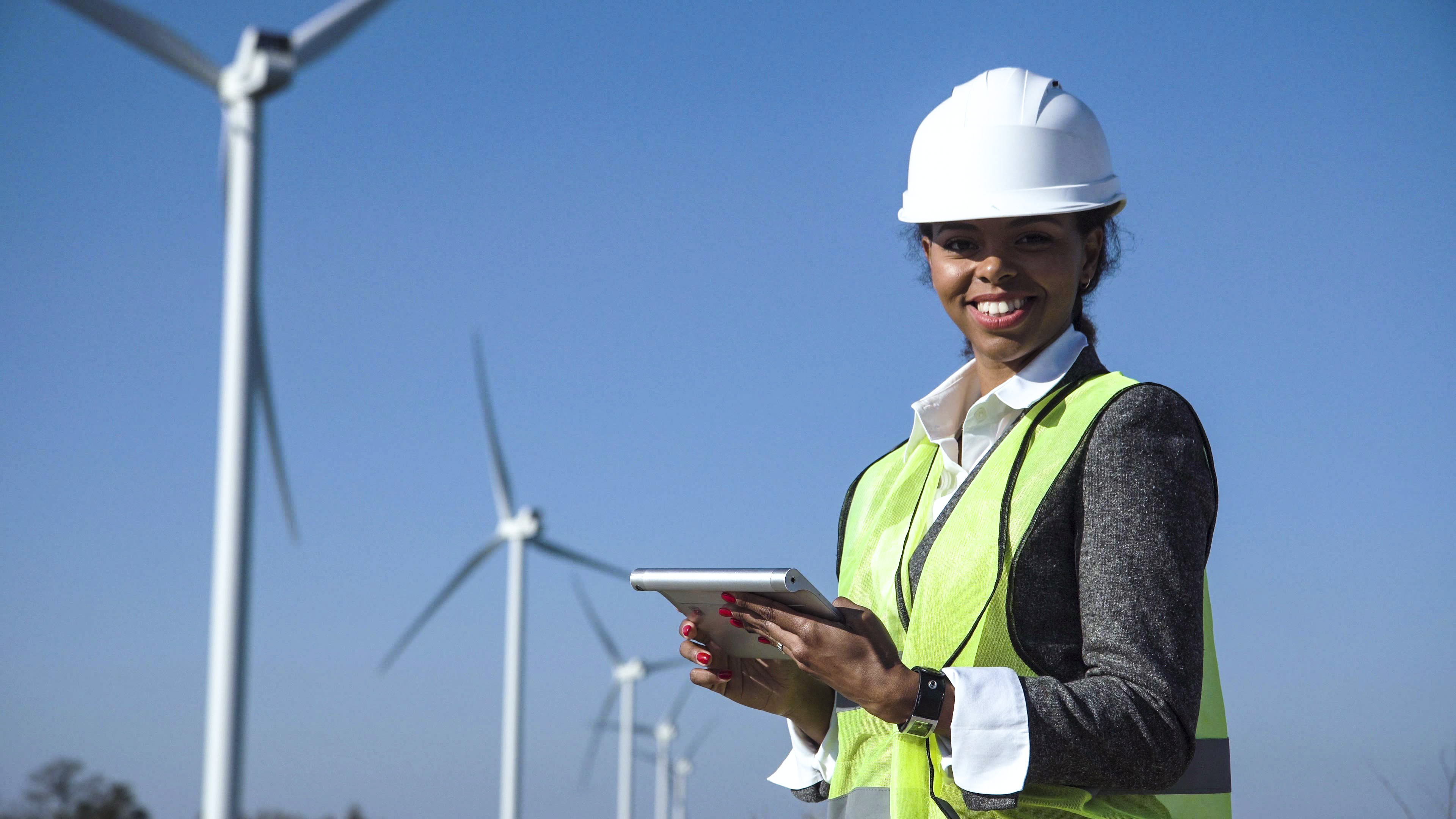 wind turbine service technician climbing turbine