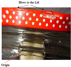 glass fractography: photo of failed jam jar, detail view showing banged jar lid, origin of crack
