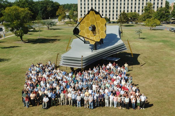 Group shot of JWST mockup with some of the development team