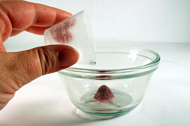 Add water to strawberry for DNA extraction
Biochemistry science project