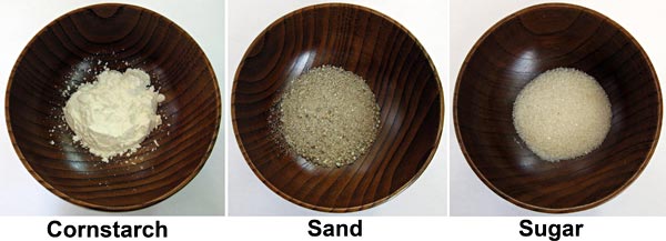 Materials Science project Picture showing bowls of sand, sugar, and cornstarch.
