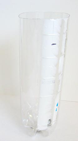 Bottle used for Winogradsky column with top cut off and marked for filling.
