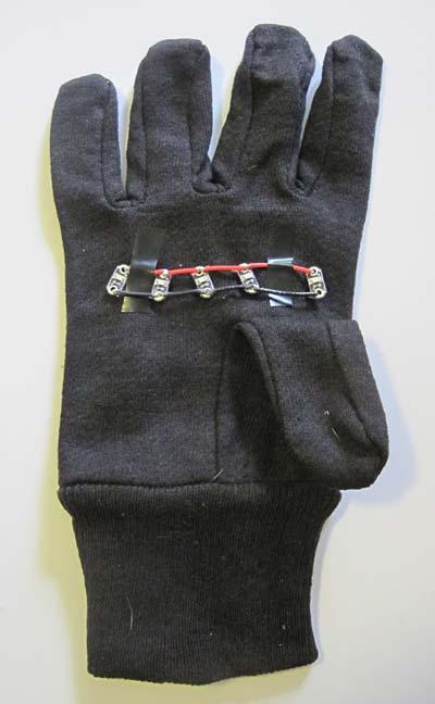 LEDs taped to traffic glove