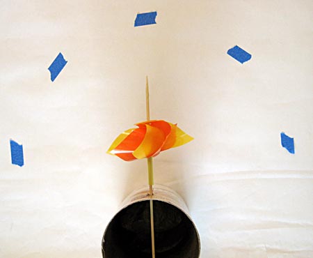 Points marked with painter's tape at a certain distance from the pinwheel.