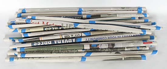 Tubes made from newspaper and blue tape.