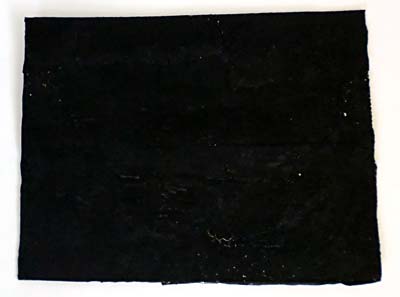 Aluminum foil sheet painted black.