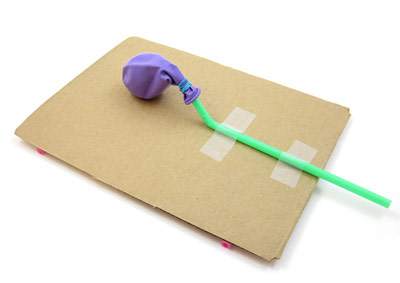 balloon attached to straw for balloon car