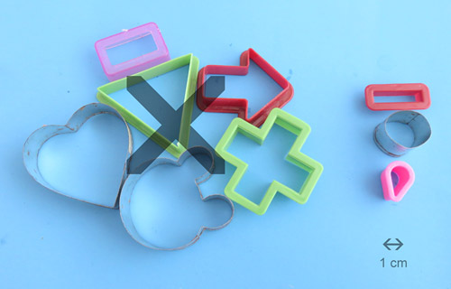 A small cookie cutter cutting out an easy shape works best to model insulin in this science project