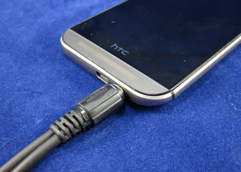 A 3.5 millimeter audio jack plugged into a smartphone
