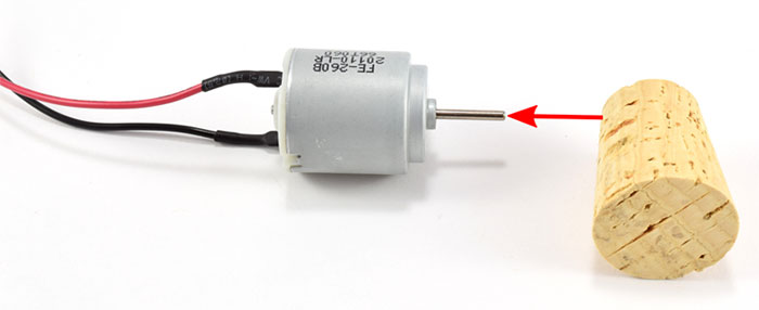 Press cork onto motor