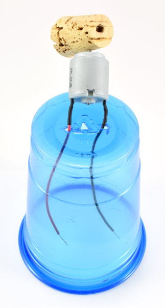 Thread motor wires through holes