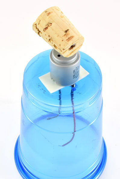 Press motor onto tape