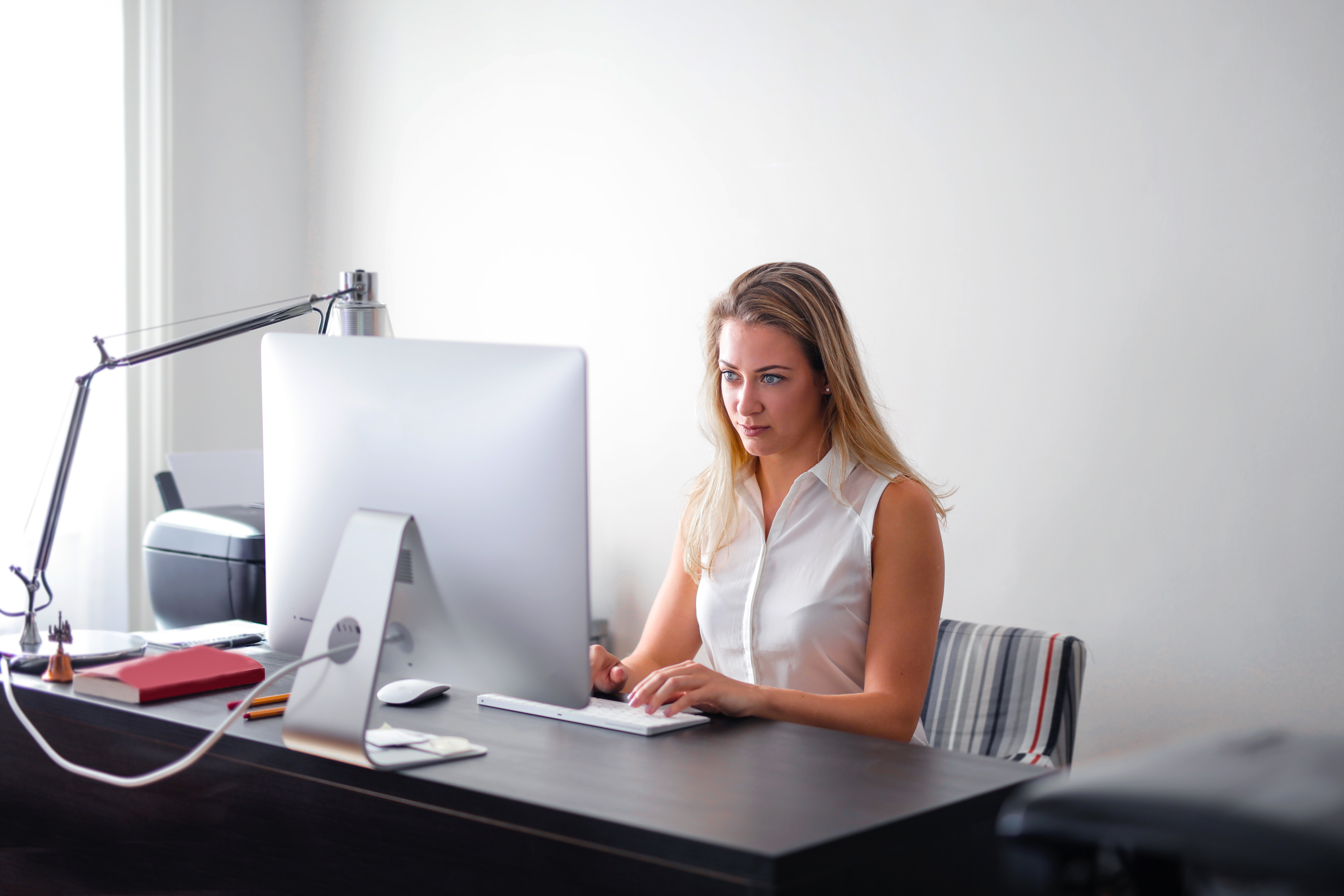 Woman checking for security holes in code/