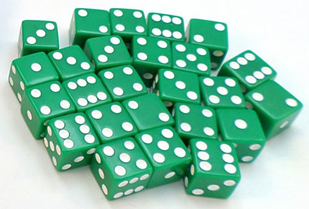 Twenty-five green dice on a table