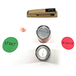 Mini golf activity with a sample hole made from a stapler and two cans of food stand between two circles labeled start and finish