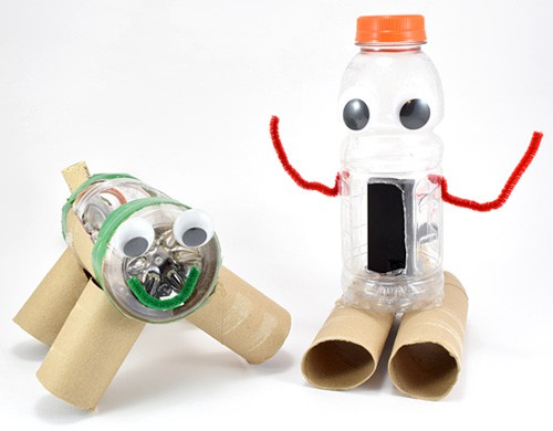 Two example junkbots made from plastic bottles and decorated with recycled materials