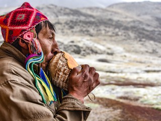 man playing flute