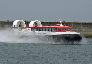 Photo of a hovercraft ferry moving over water