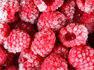 close up shot of frozen raspberries