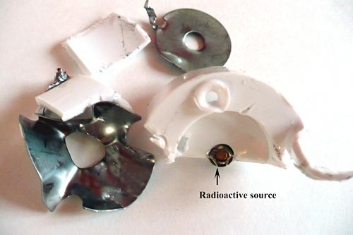 Radioactive source housing broken to reveal the radioactive source