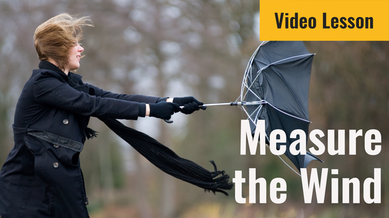 Video lesson about measuring the wind - A woman is holding an umbrella that is turned inside out.