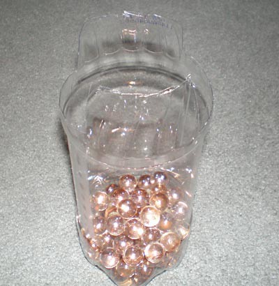 A water bottle filled with marbles