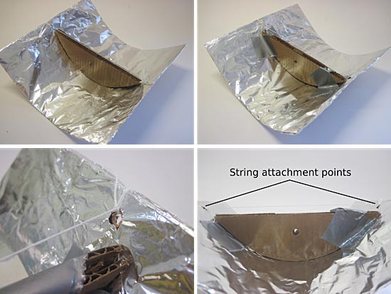String holds the shape of a cardboard sheet wrapped in aluminum foil as it bends around a parabola template