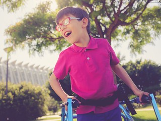 child walking with walker