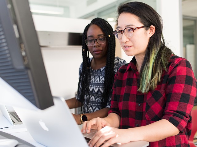 people sitting at computer