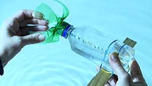 making plastic bottle submarine to study buoyancy 