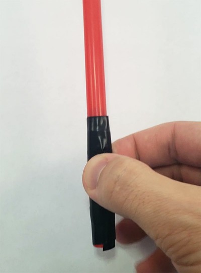 Handle wrapped in electrical tape 