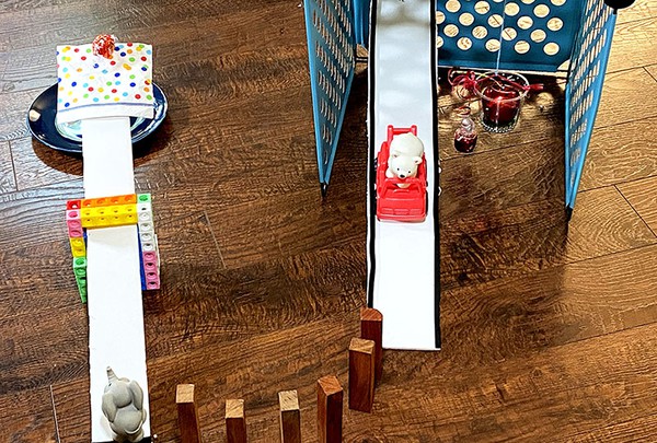 A Rube Goldberg machine example .