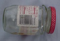 Lid broken off the top of a glass jar