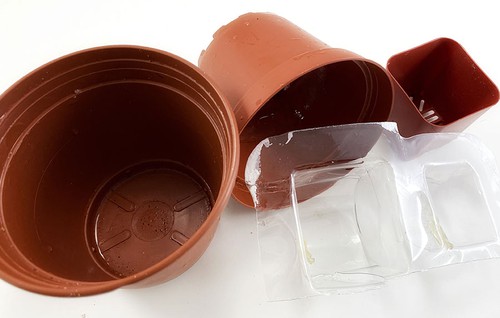 Molded plastic packaging and plastic plant containers