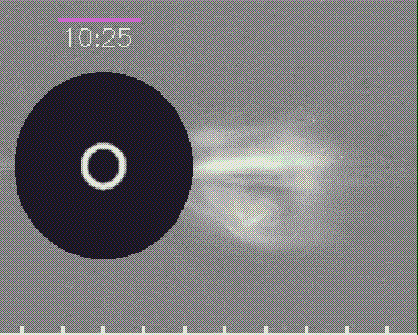 A coronagraph shows a large white flare dissipating from the surface of the Sun with a timestamp of 10:25