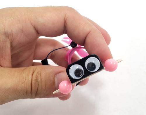car with googly eyes 