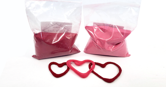 Heart sculptures made with sand and glue in 3D printing activity