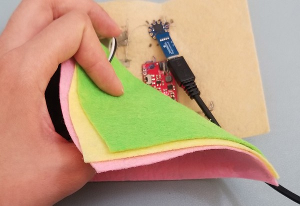 MicroUSB and USB adapter connected to TinyLily on base patch. 