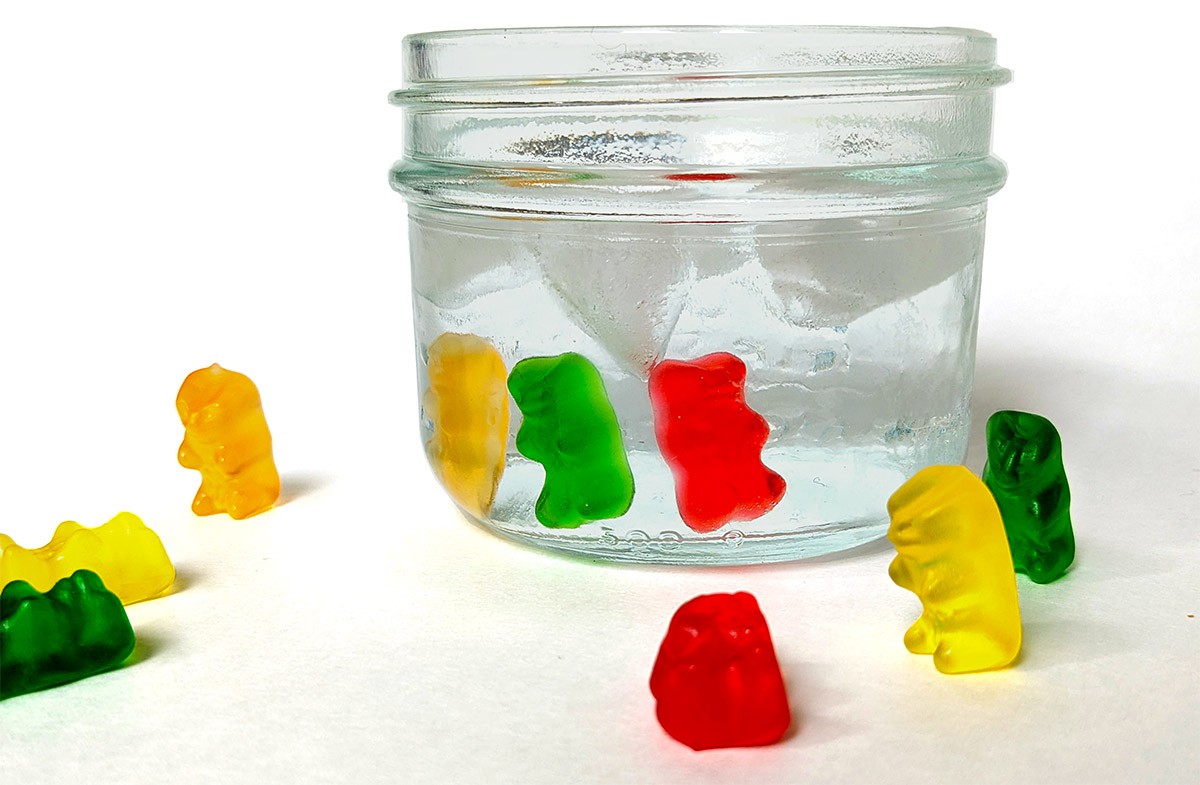 Four gummy bears melting